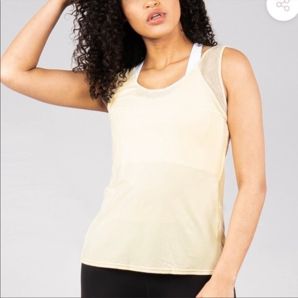 SOLD ON MERC Buffbunny essence mesh tank L